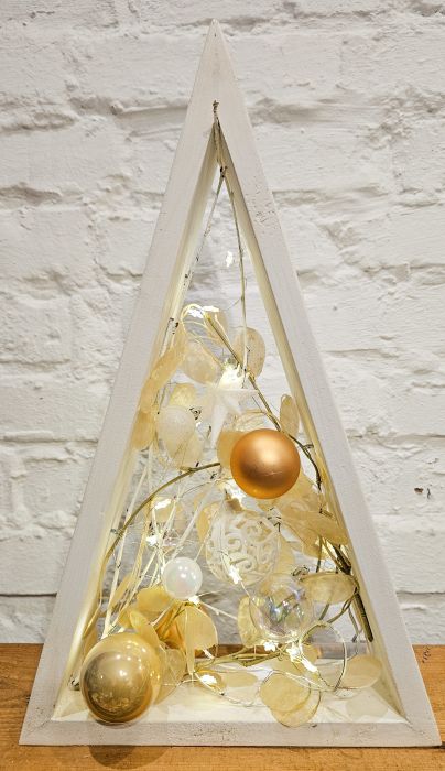 Decorative triangular Christmas tree with gold balls