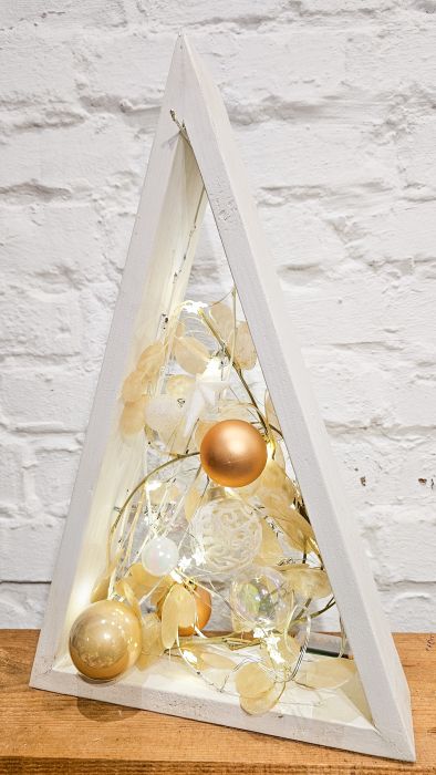 Decorative triangular Christmas tree with gold balls