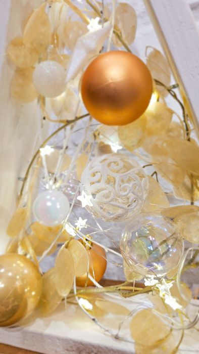 Decorative triangular Christmas tree with gold balls