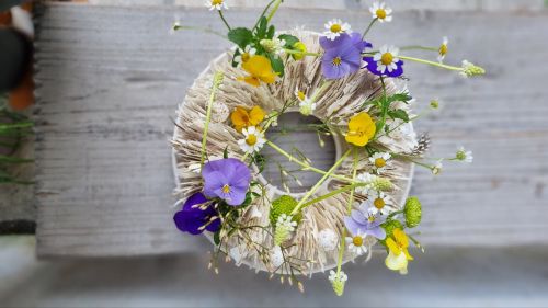 Easter wreath with violets and daisies
