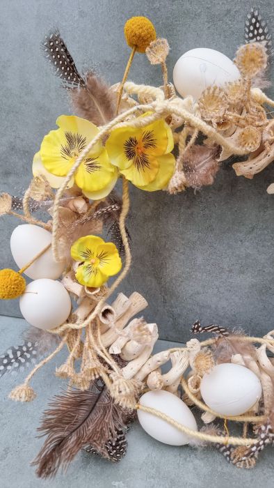 Easter wreath with viola and craspedia